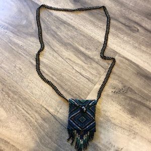 Adorable beaded purse necklace .